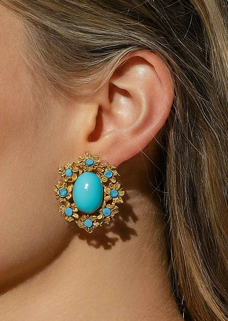 A Woman Wearing vintage Jewelry earrings